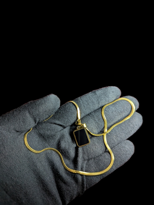 Dual sided Pendant Pearl White & Black in Golden Chain