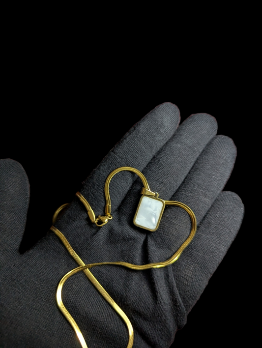 Dual sided Pendant Pearl White & Black in Golden Chain