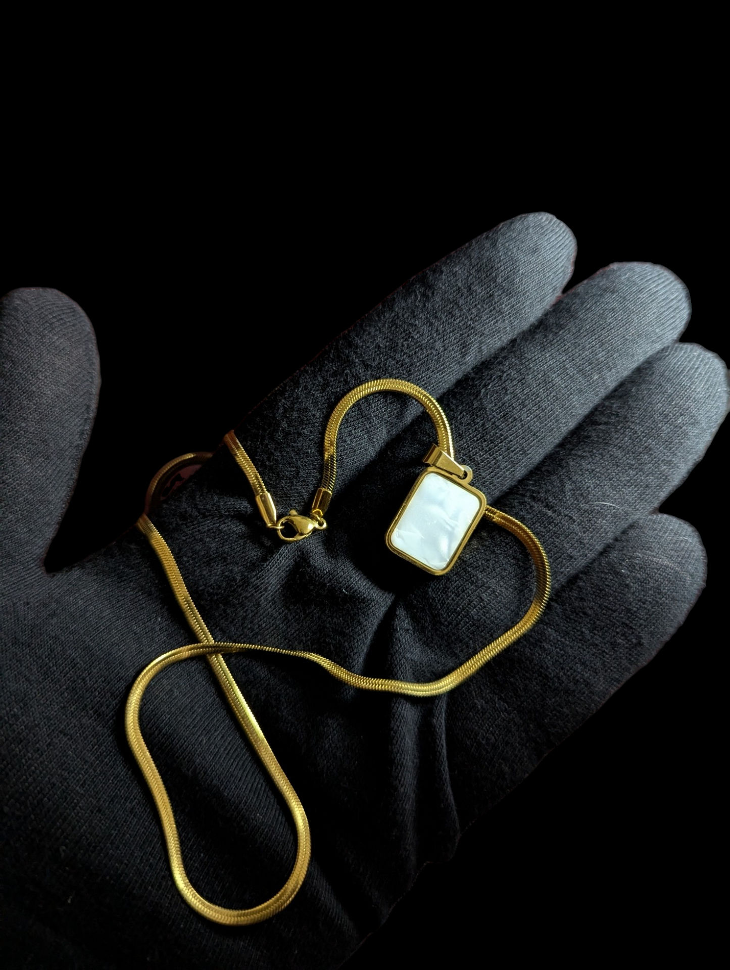 Dual sided Pendant Pearl White & Black in Golden Chain